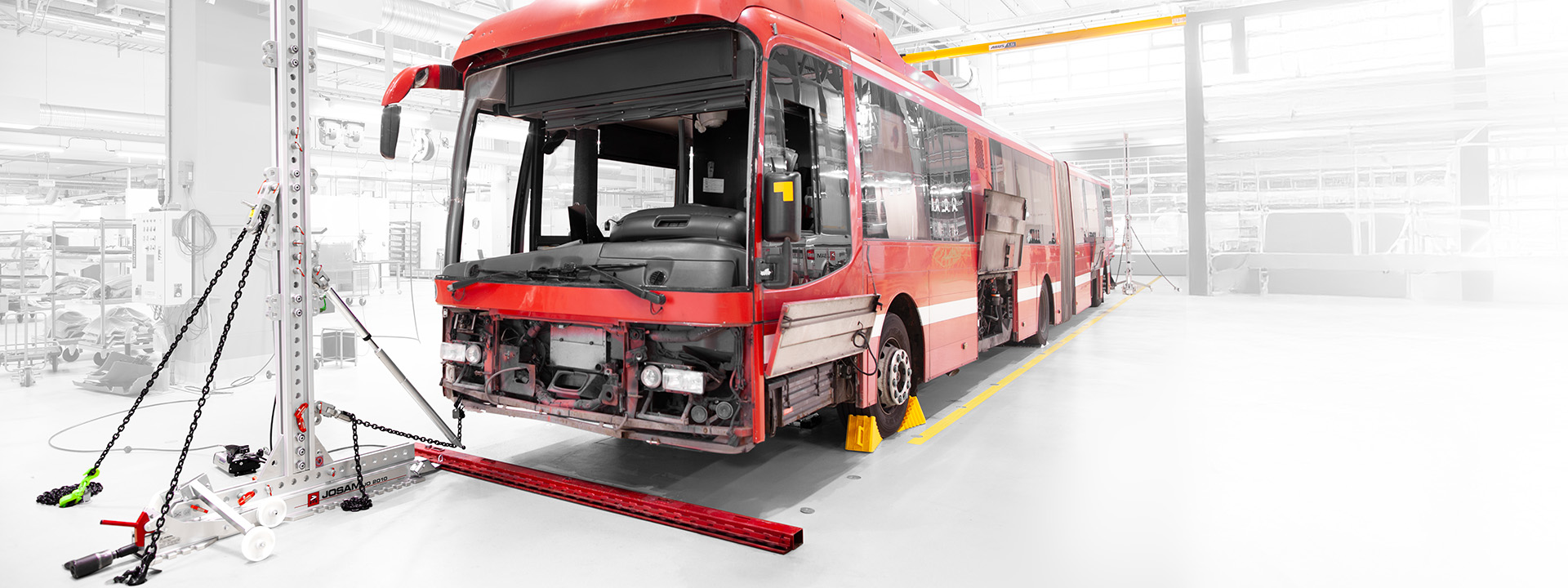 A JOSAM Cab Tower being used to repair a bus