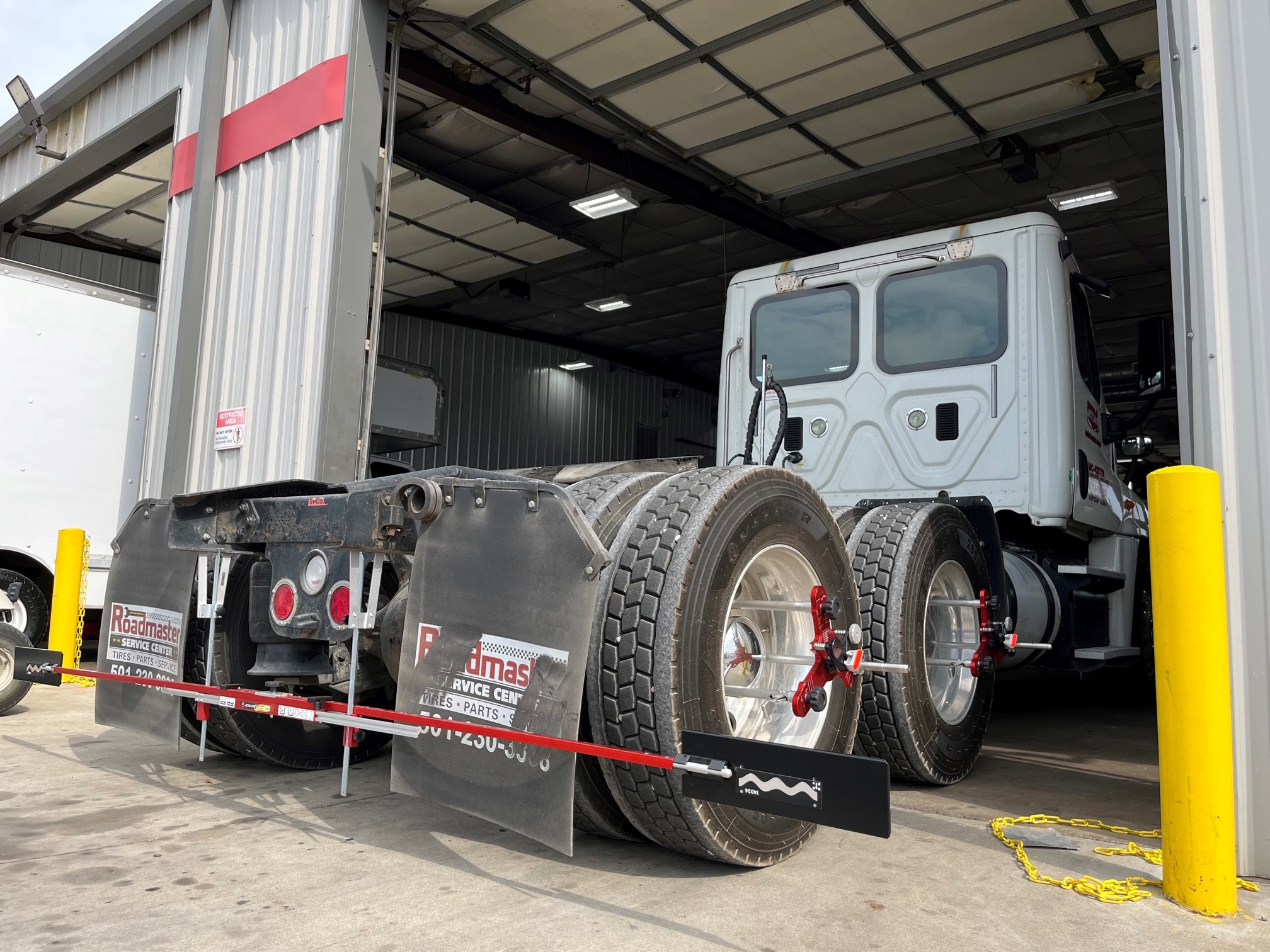 Semi truck being aligned with JOSAM Cam-Aligner