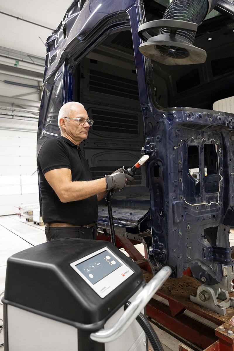 Technician using JOSAM JH400 to heat part of a truck cab
