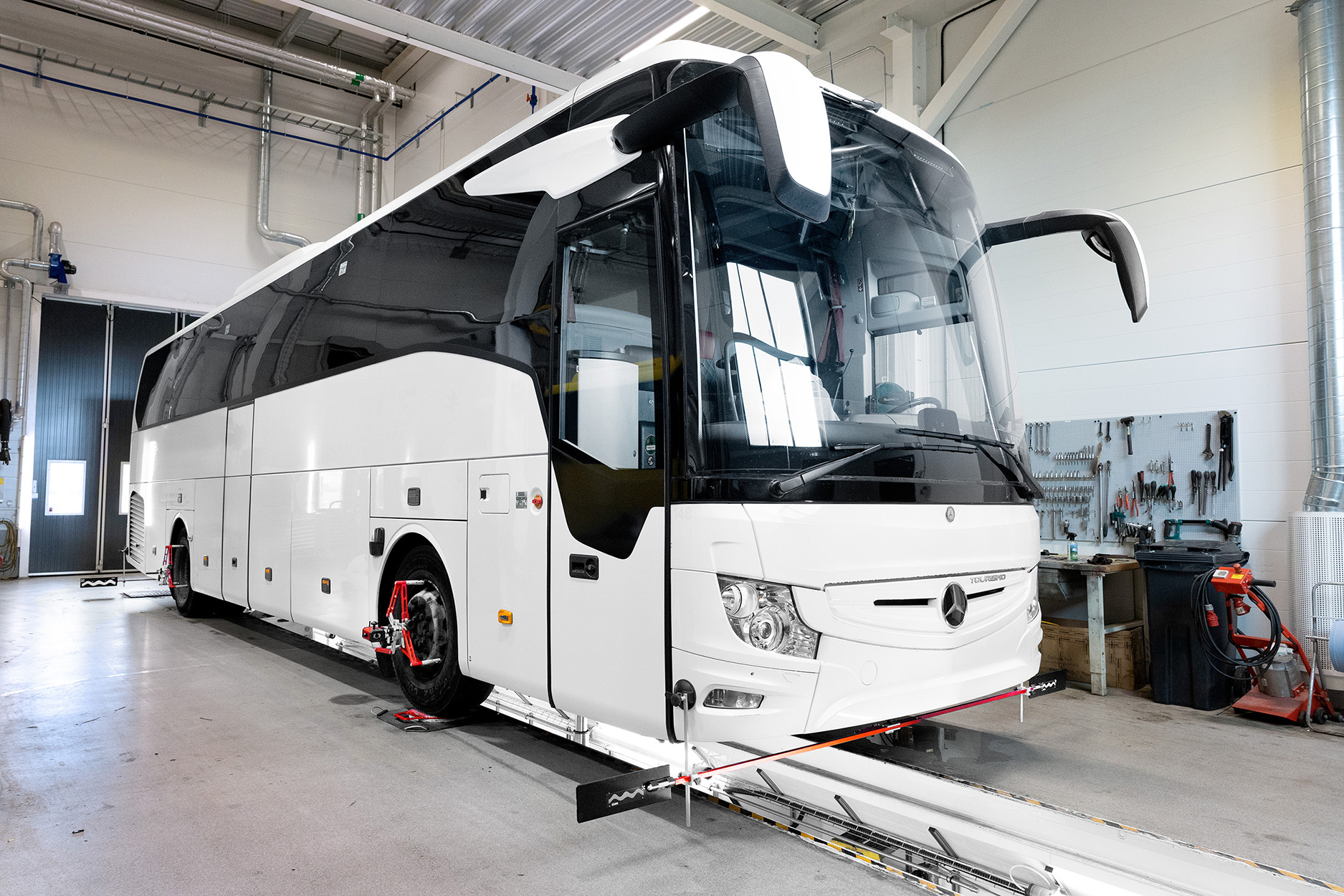 A bus with Josam Cam-Aligners attached