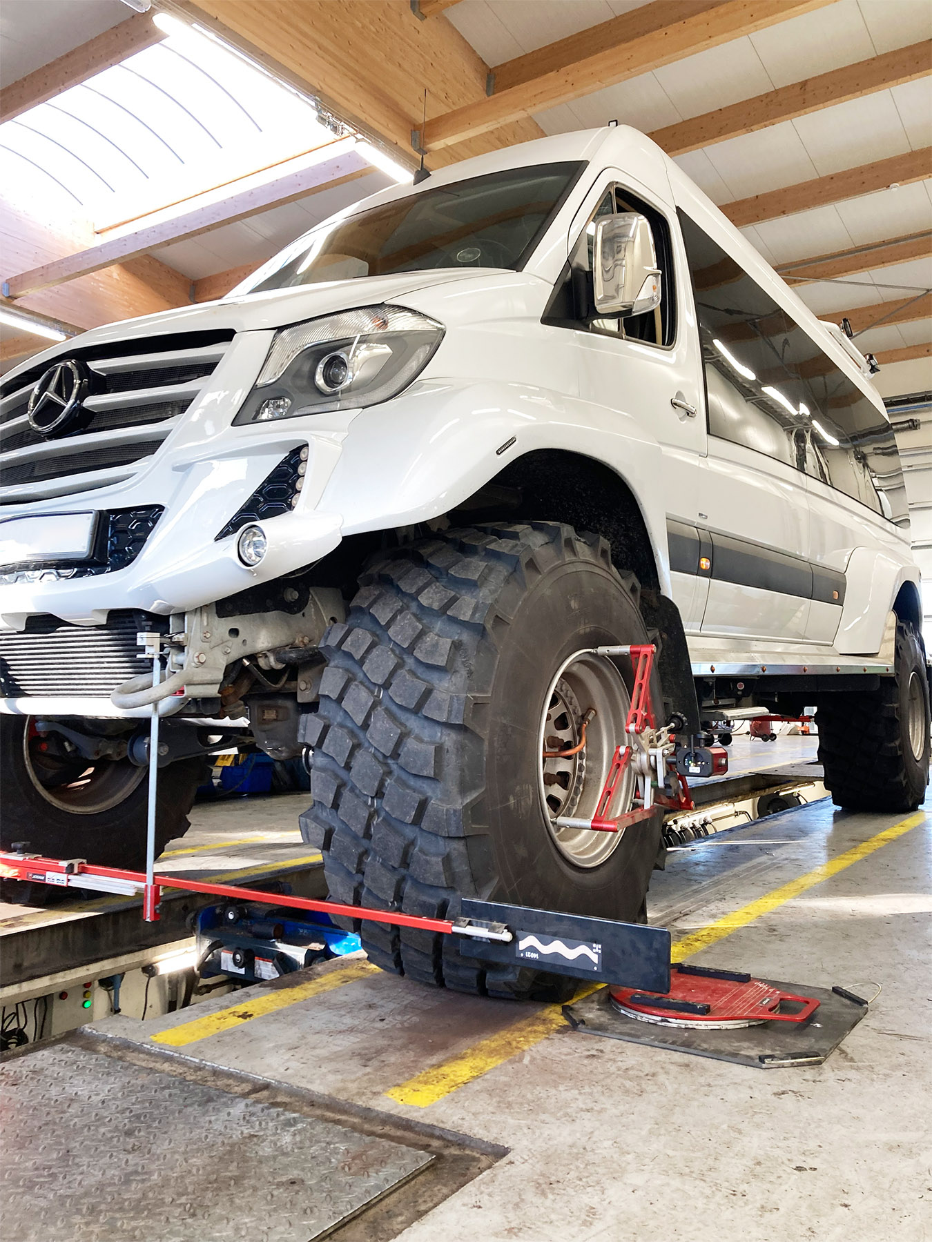 An off-roading van with Josam Cam-Aligners attached