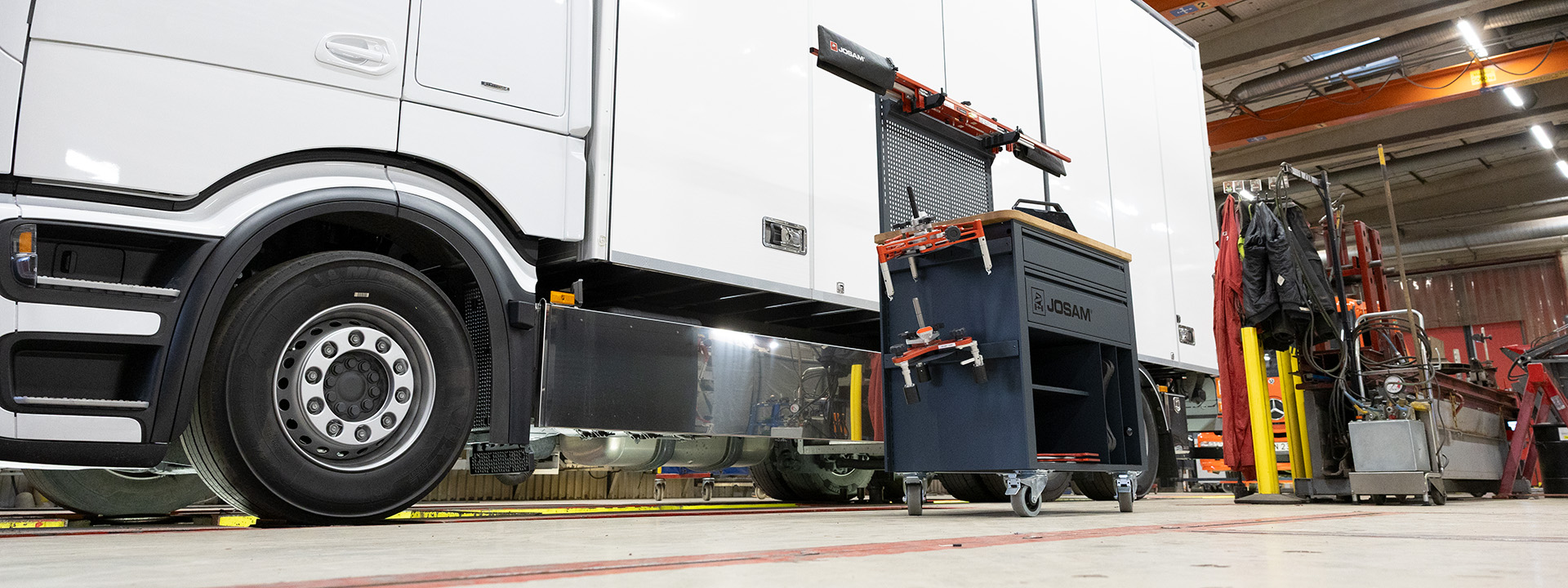 JOSAM Wheel Alignment Cabinet and Truck in the workshop