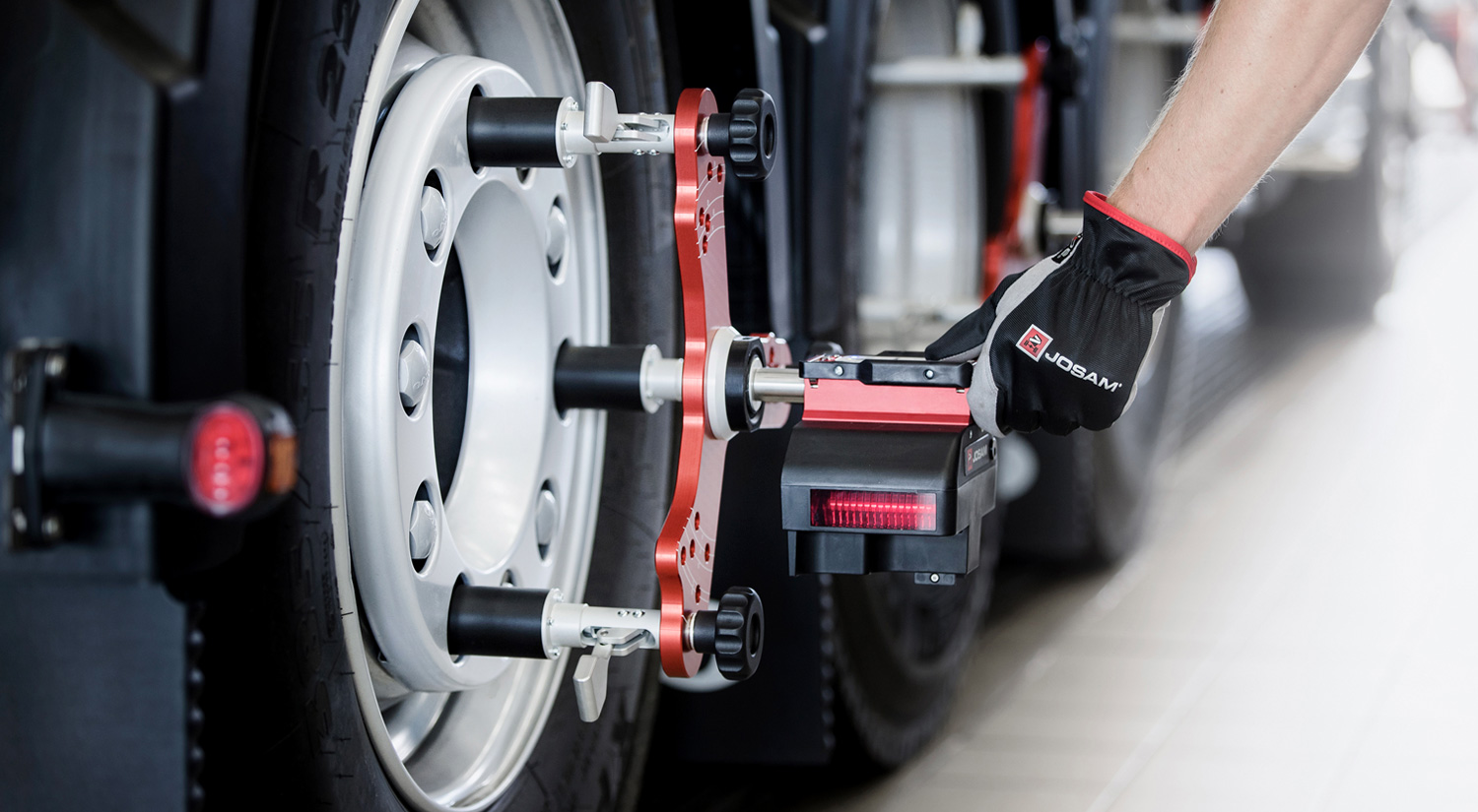 I-Track II wheel alignment attached to a truck wheel