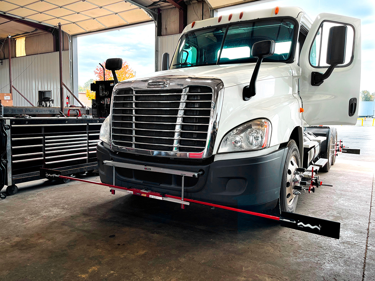 Semi truck being aligned with JOSAM Cam-Aligner