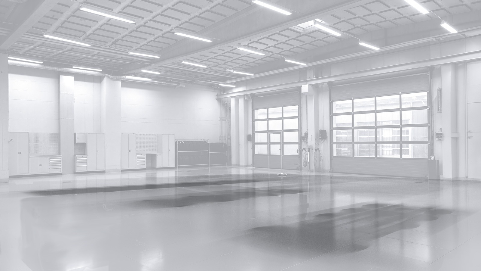 grayscale image of a garage workshop