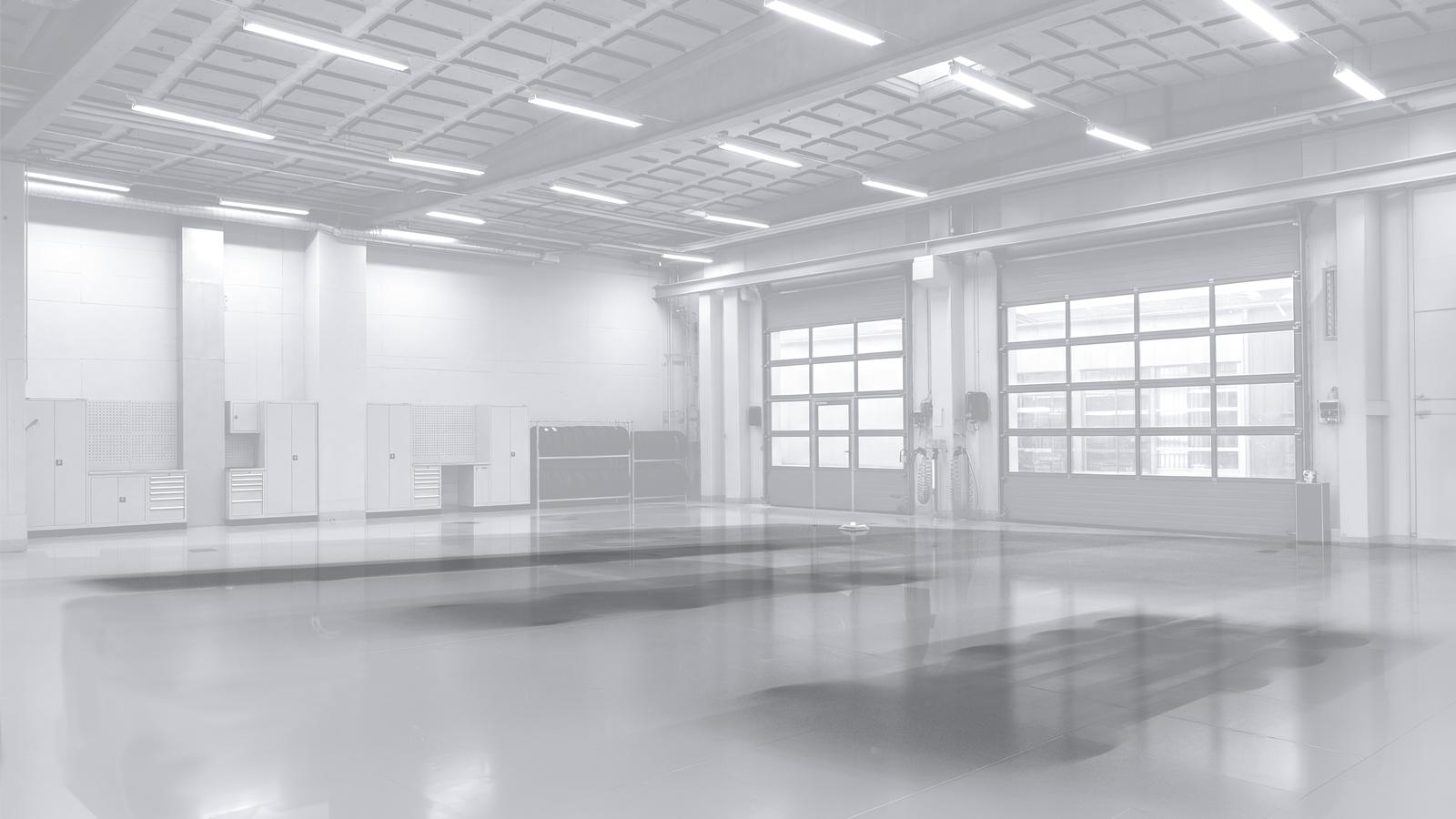 grayscale image of a garage workshop