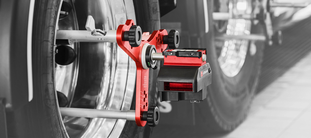I-Track II wheel aligner attached to truck wheel